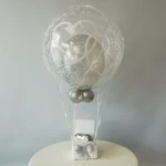 Fesselballon zur Hochzeit mit einem Umschlag im Korb Fessel-Ballon zur Hochzeit